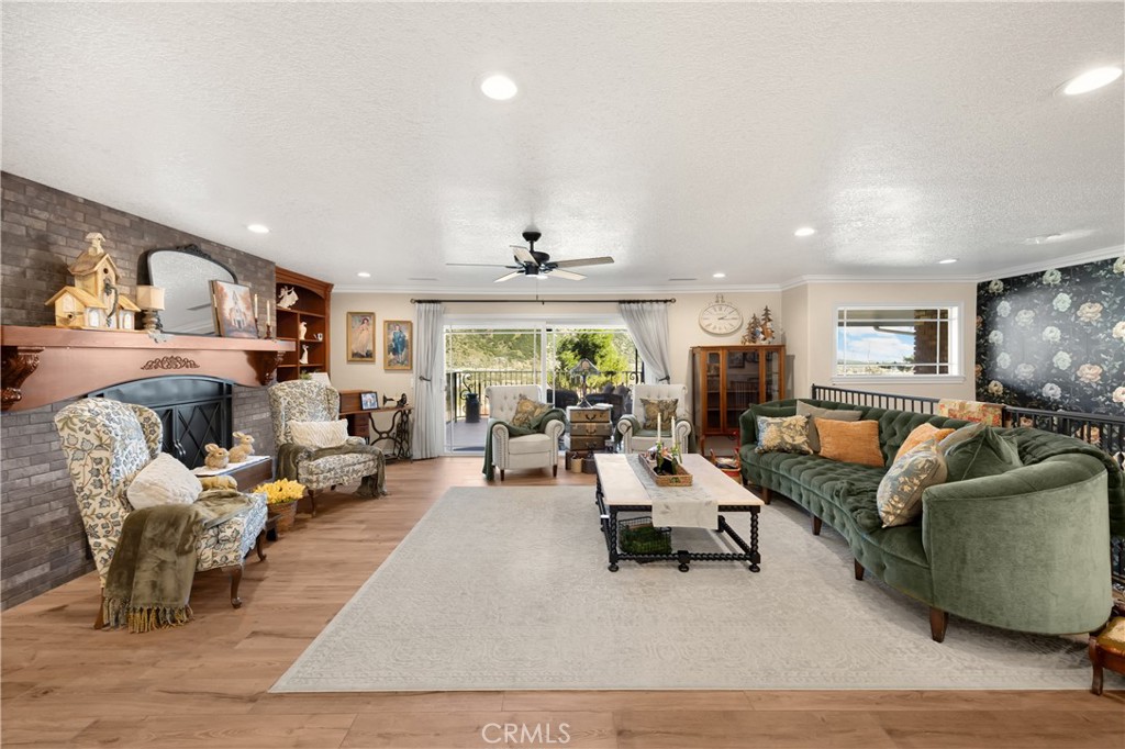 3070 Lytle Creek Road Lytle Creek, CA 92358 - Photo 7 of 68 a living room with furniture and a flat screen tv