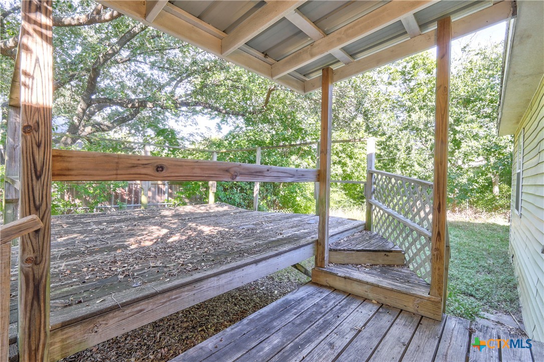 1415 North 7th Street Temple, TX 76501 - Photo 13 of 14 a view of a porch with wooden floor