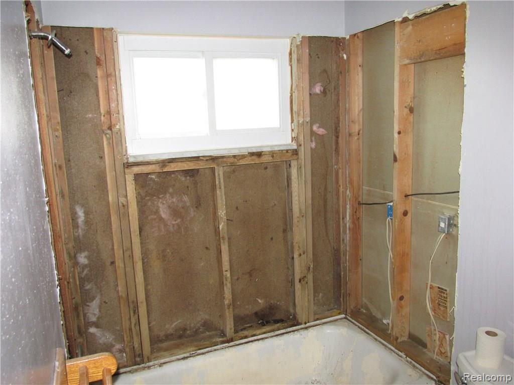 705 Hamlet Road Auburn Hills, MI 48326 - Photo 14 of 27 Bathroom missing wall and a vanity.