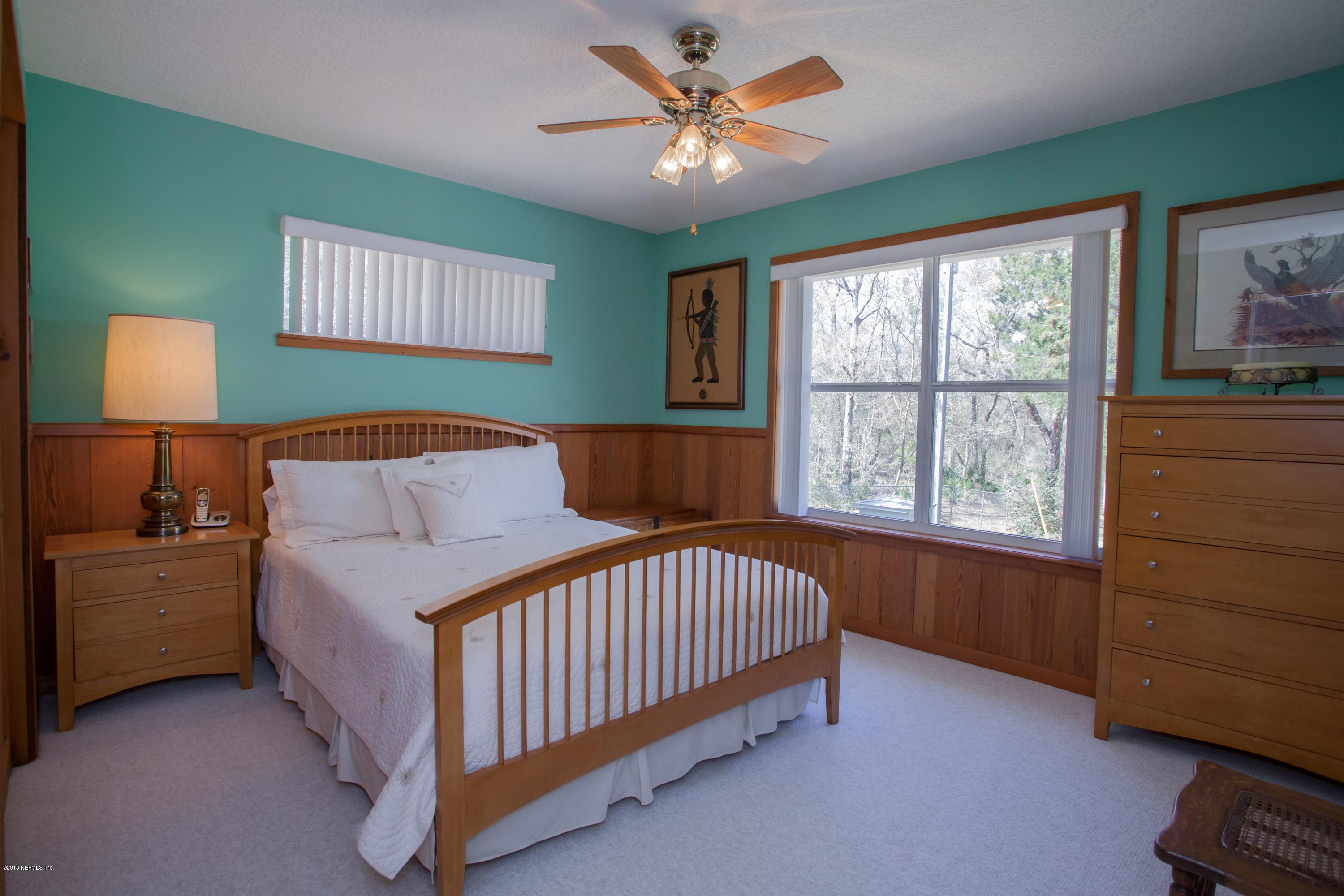7986 National Forest Road Palatka, FL 32177 - Photo 20 of 31 a bedroom with a bed and a window