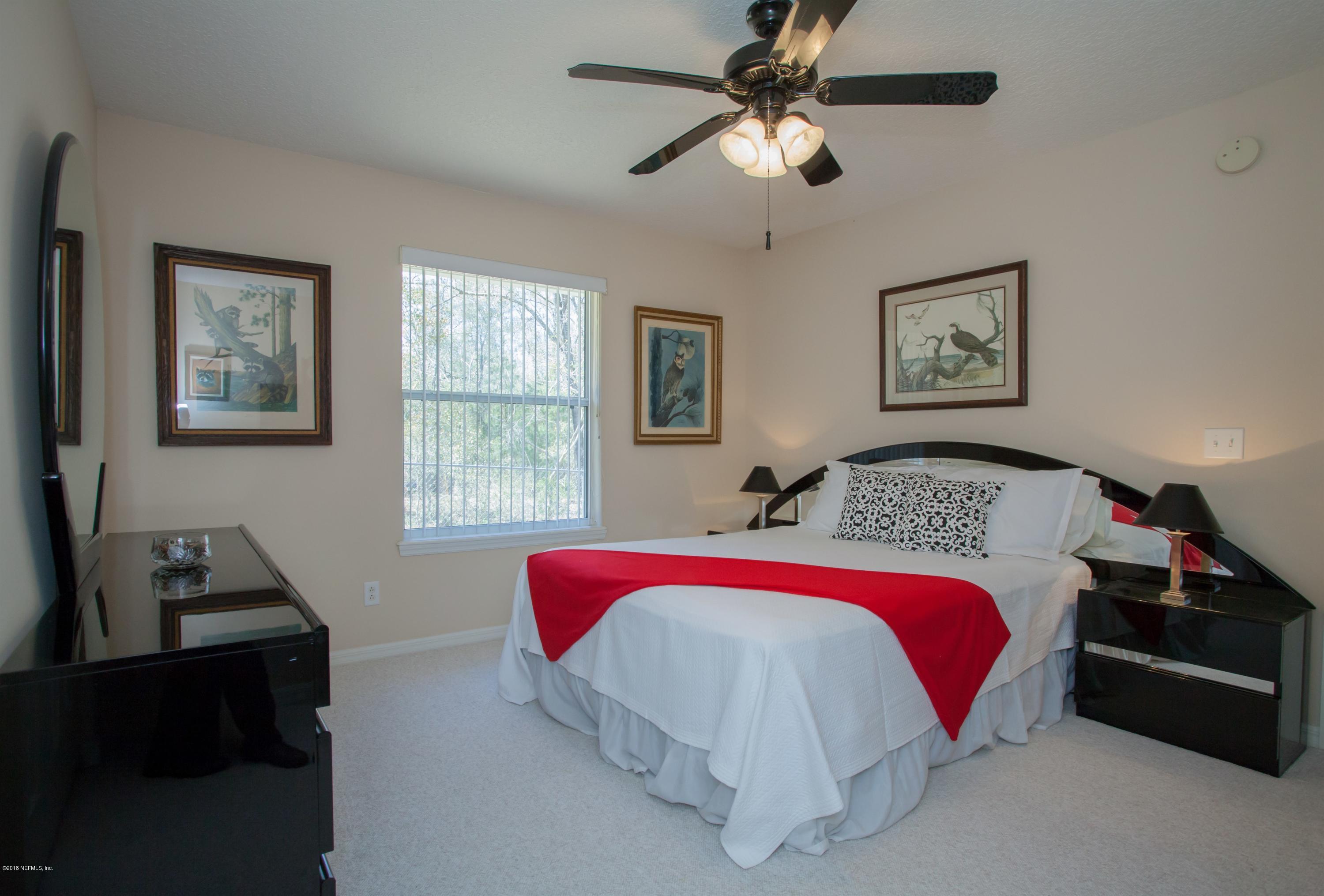 7986 National Forest Road Palatka, FL 32177 - Photo 22 of 31 a bed room with a bed and a window