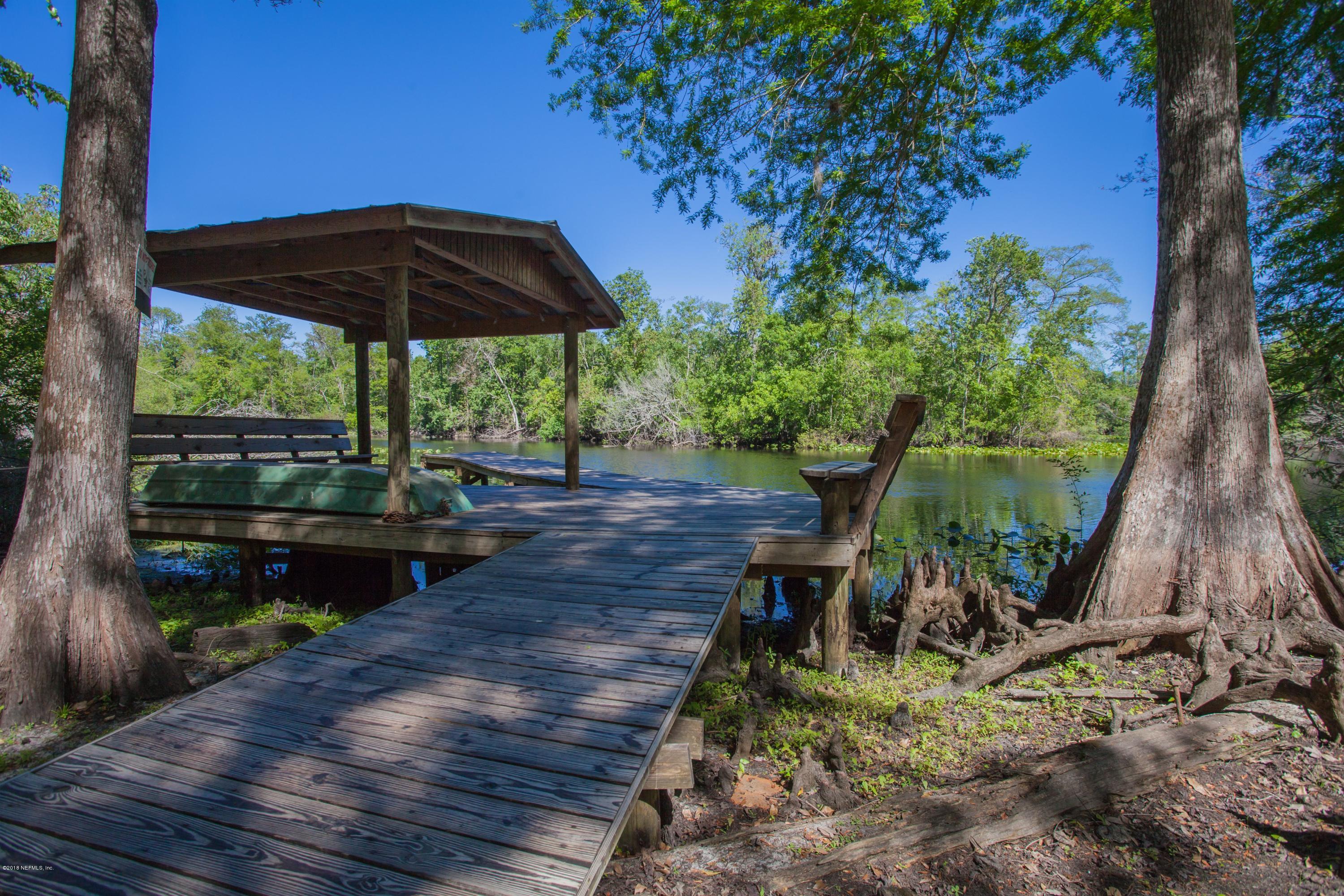 7986 National Forest Road Palatka, FL 32177 - Photo 30 of 31 a view of a bench in the garden