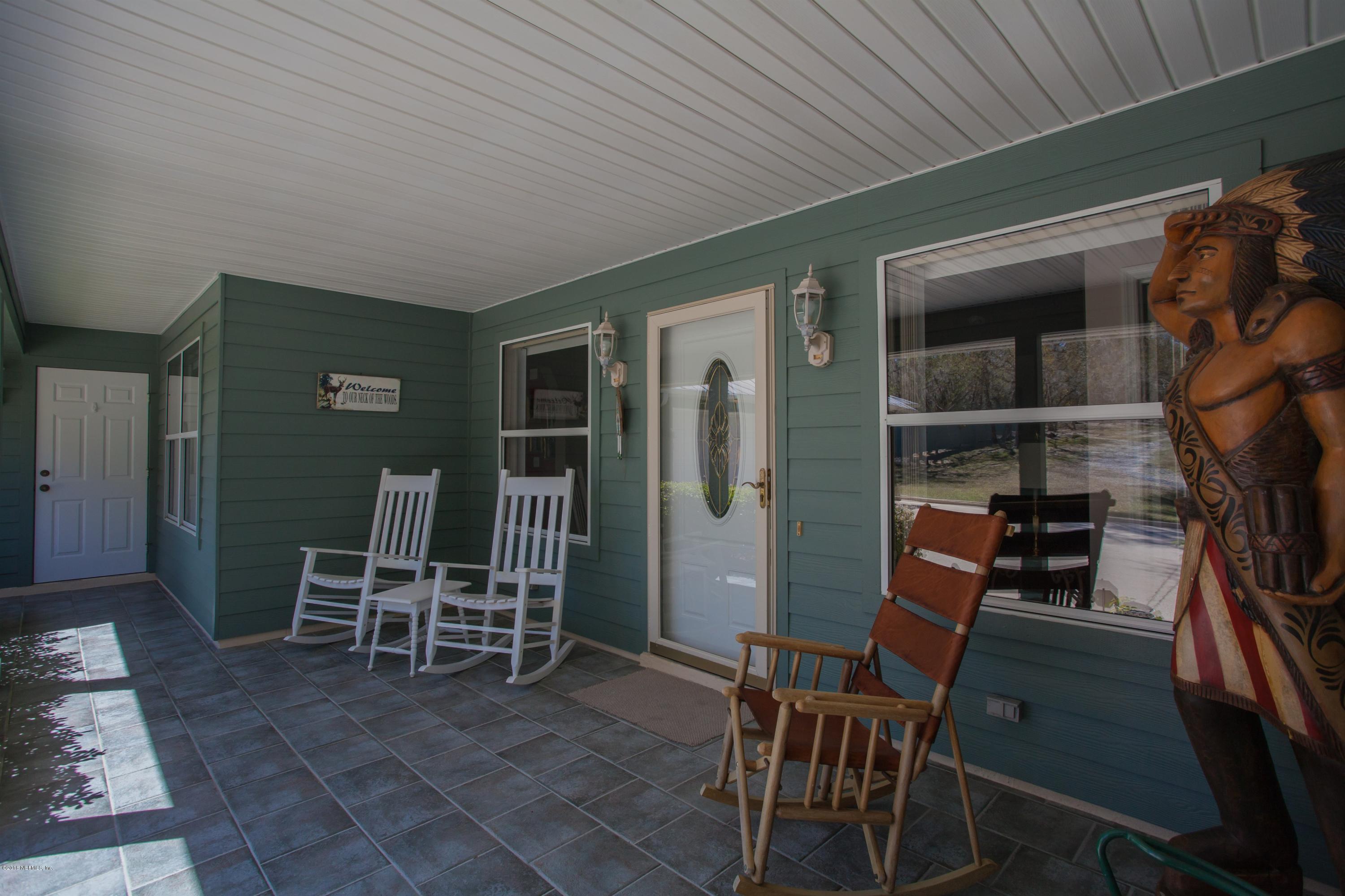 7986 National Forest Road Palatka, FL 32177 - Photo 5 of 31 a view of dining room and chairs and table in a room
