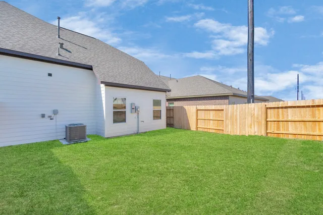 a big room with table and chairs