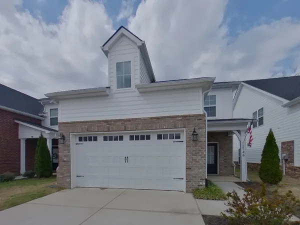 front view of a house with a garage