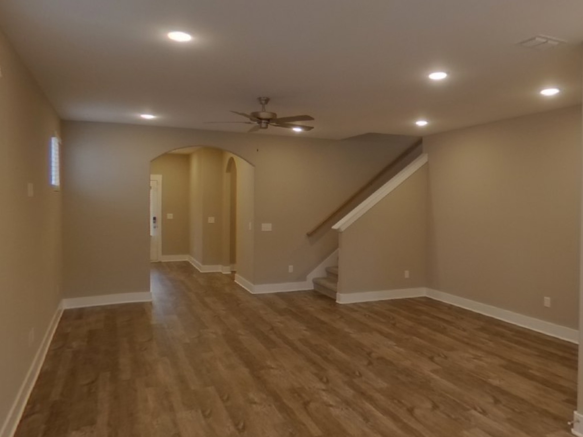 2144 Welltown Lane Murfreesboro, TN 37128 - Photo 2 of 10 an empty room with wooden floor and windows