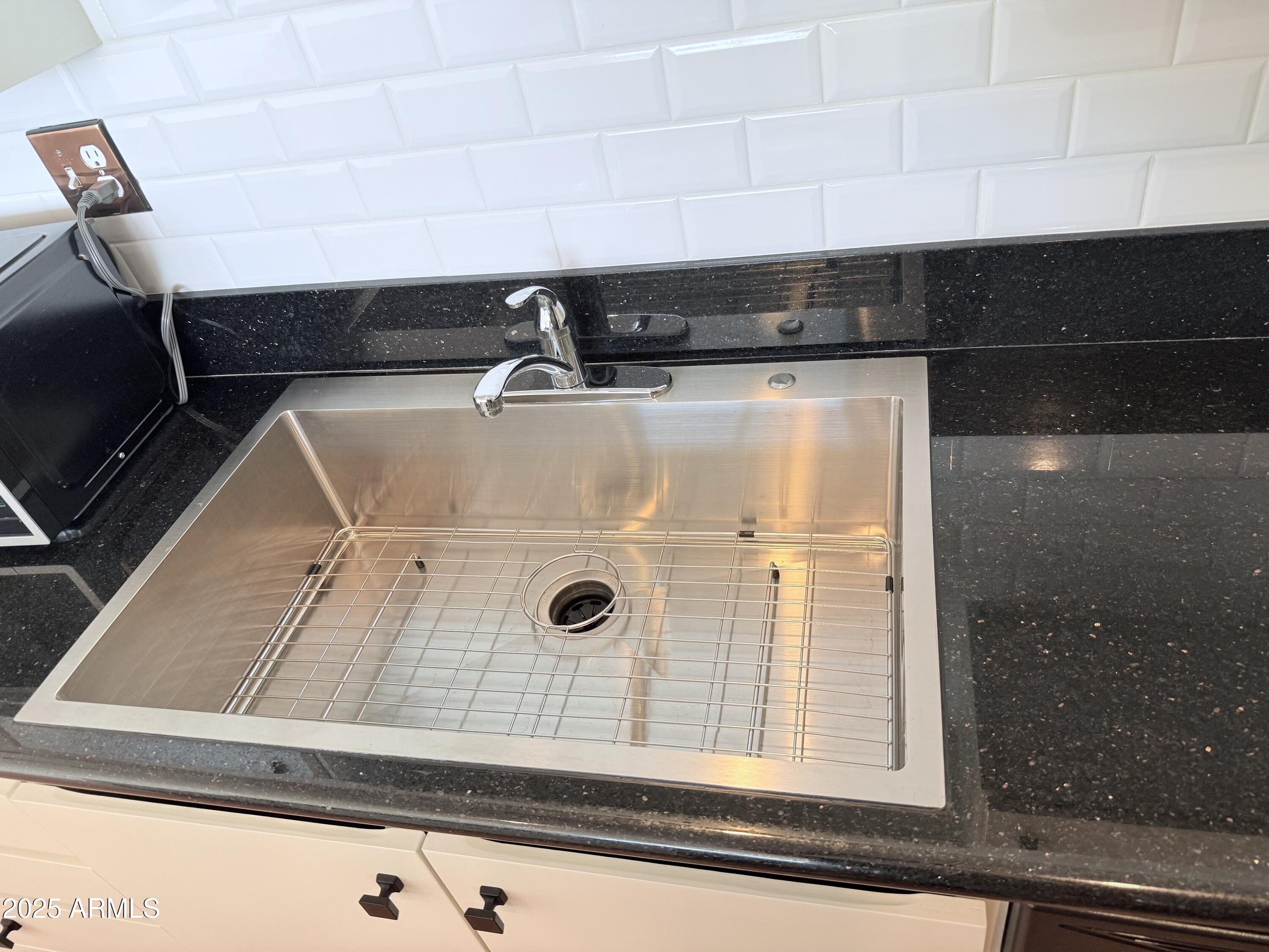 207 West Clarendon Avenue, Unit 4H Phoenix, AZ 85013 - Photo 17 of 37 a close view of sink