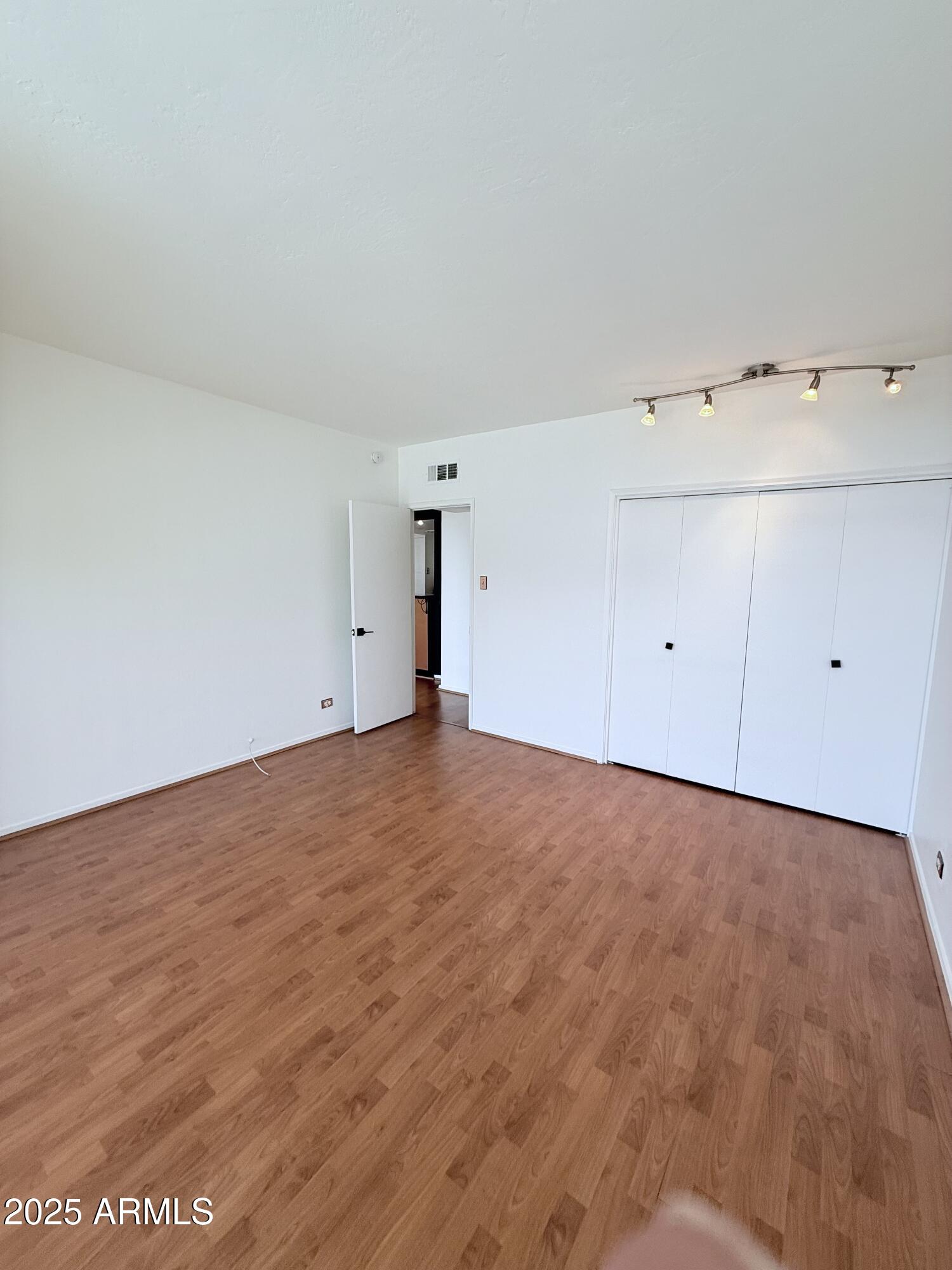 207 West Clarendon Avenue, Unit 4H Phoenix, AZ 85013 - Photo 33 of 37 a view of an empty room