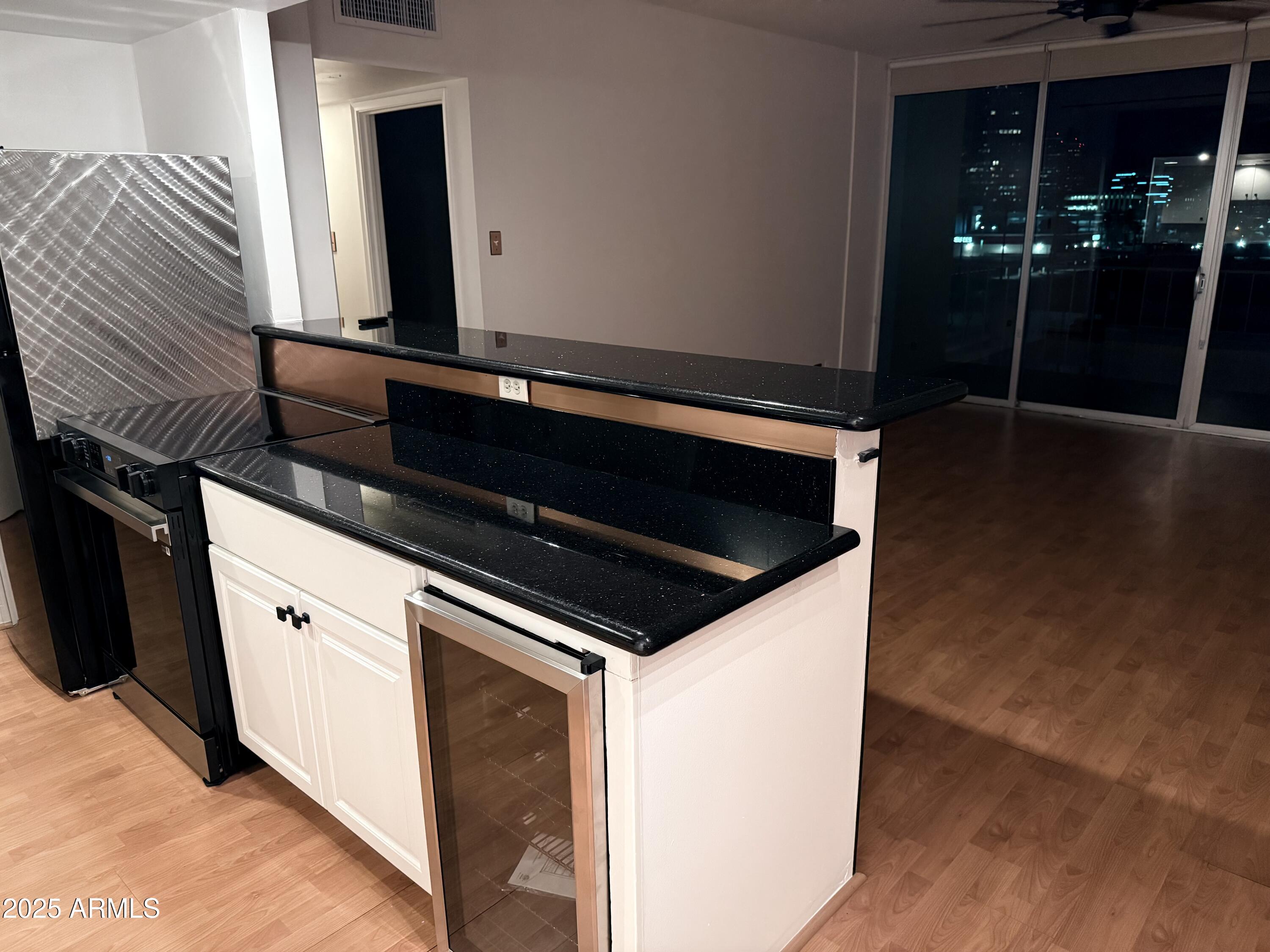 207 West Clarendon Avenue, Unit 4H Phoenix, AZ 85013 - Photo 5 of 37 a view of washer and dryer