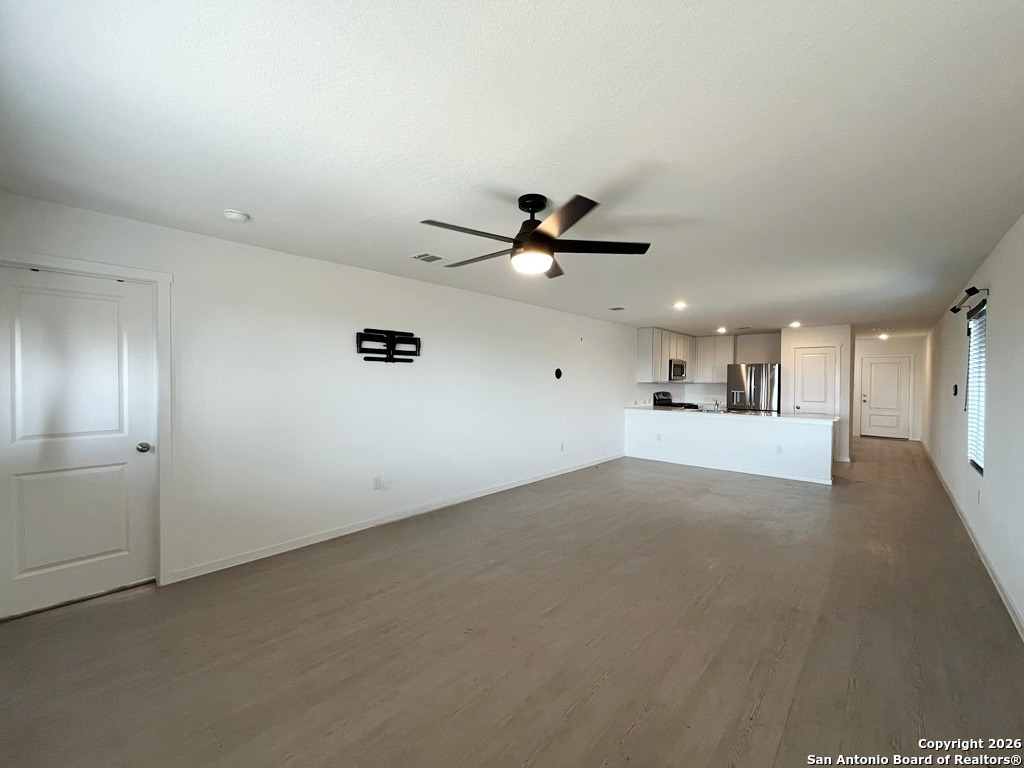 248 Cowboy Ridge Pleasanton, TX 78064 - Photo 13 of 37 a view of a livingroom with a ceiling fan