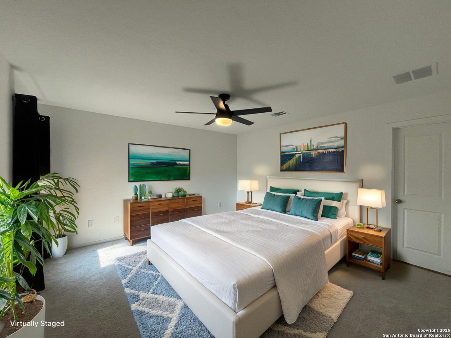 248 Cowboy Ridge Pleasanton, TX 78064 - Photo 4 of 37 a bedroom with a bed and a flat screen tv