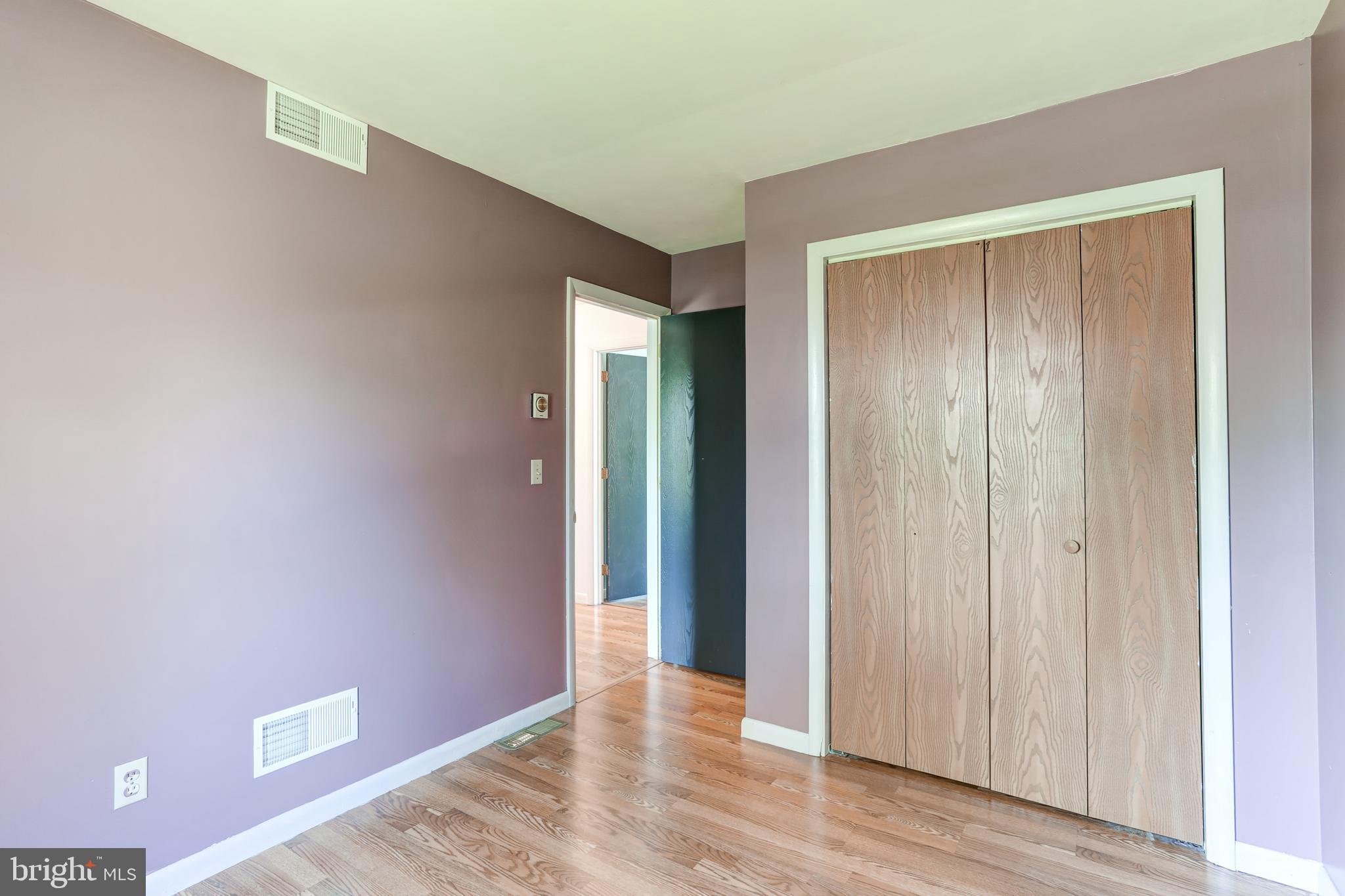 447 West Ridge Road Elizabethtown, PA 17022 - Photo 16 of 28 a view of an empty room with wooden floor and closet
