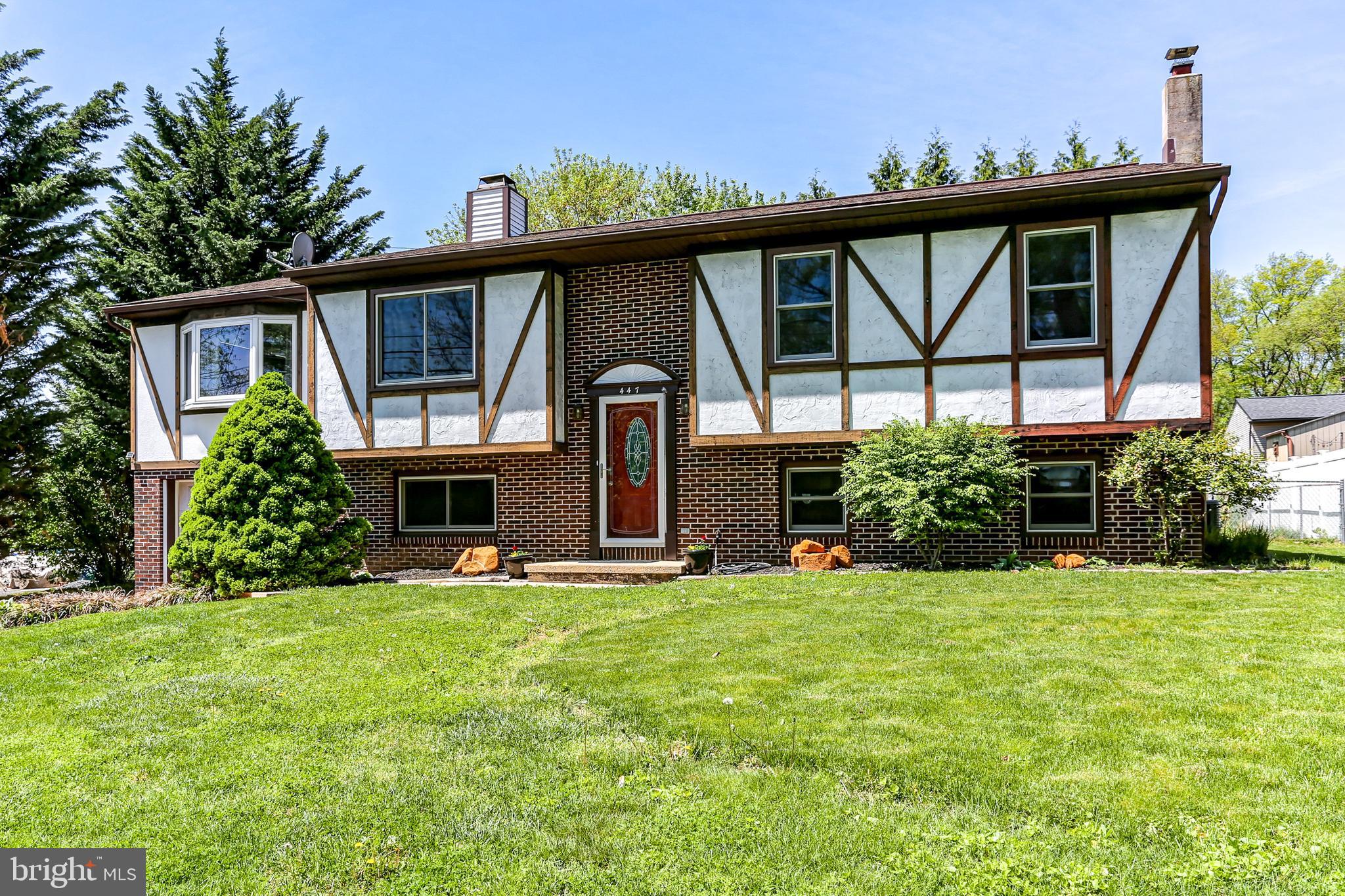 447 West Ridge Road Elizabethtown, PA 17022 - Photo 2 of 28 a front view of a house with garden