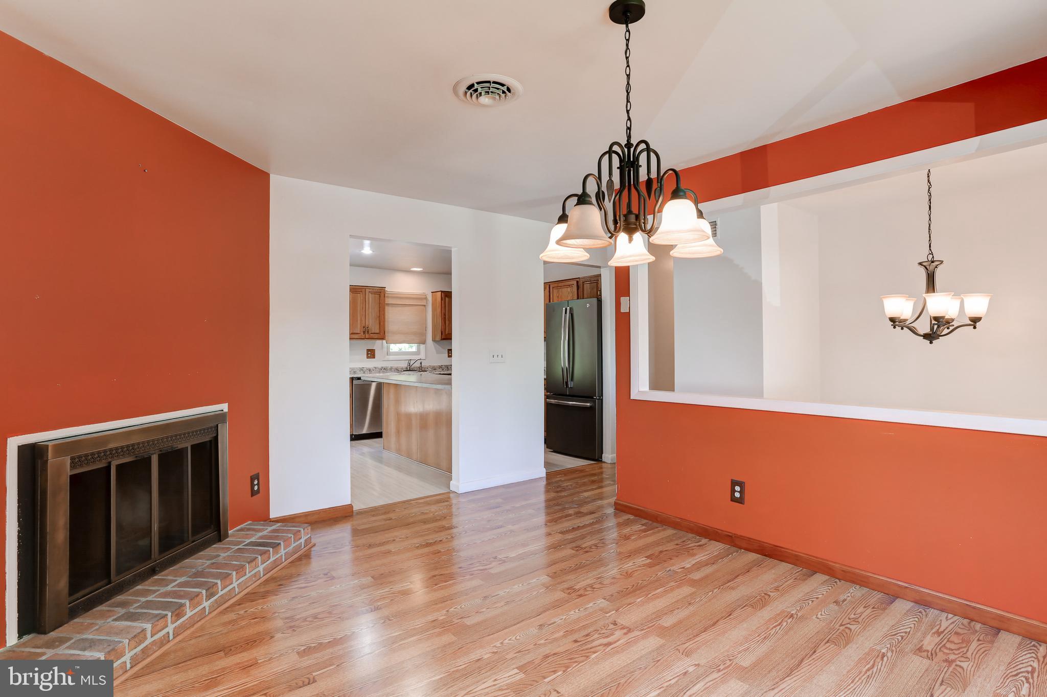 447 West Ridge Road Elizabethtown, PA 17022 - Photo 5 of 28 a view of a kitchen with wooden floor and a ceiling fan