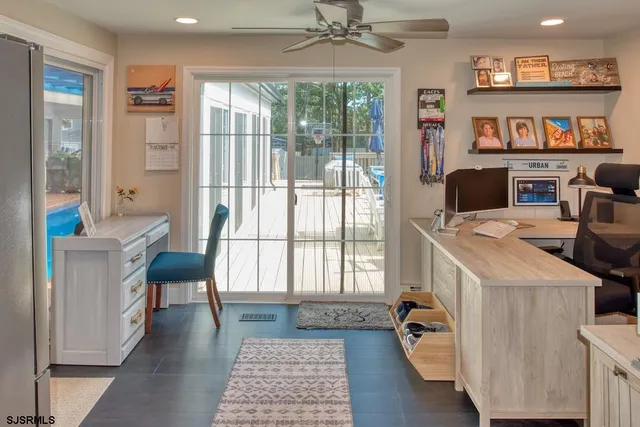 a workspace with furniture hardwood and a window
