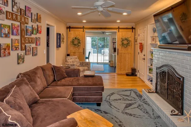 a bedroom with furniture and a fireplace