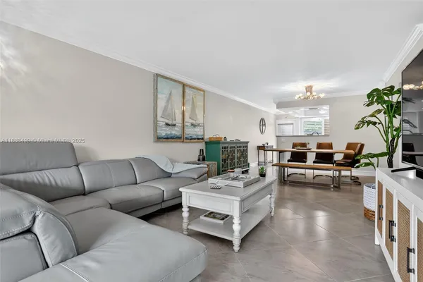 a living room with furniture and a couch