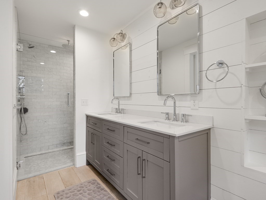 18 Brackett Road Newton, MA 02458 - Photo 18 of 32 a bathroom with a sink a toilet and shower