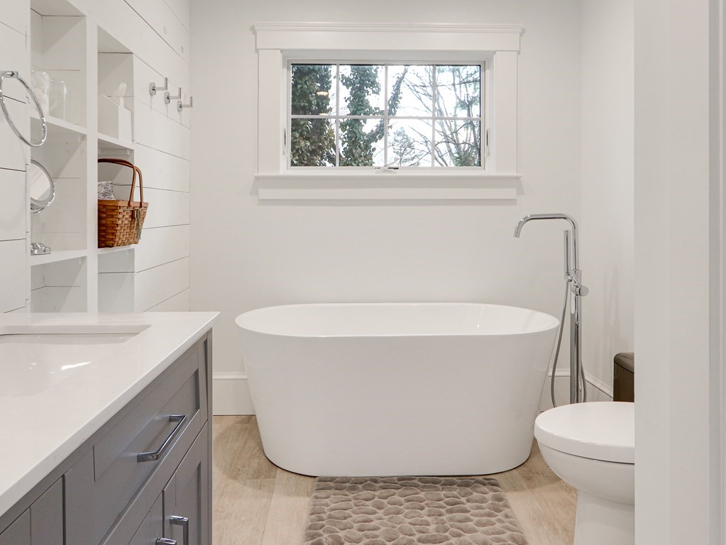 18 Brackett Road Newton, MA 02458 - Photo 19 of 32 a bathroom with a sink a toilet and a bathtub