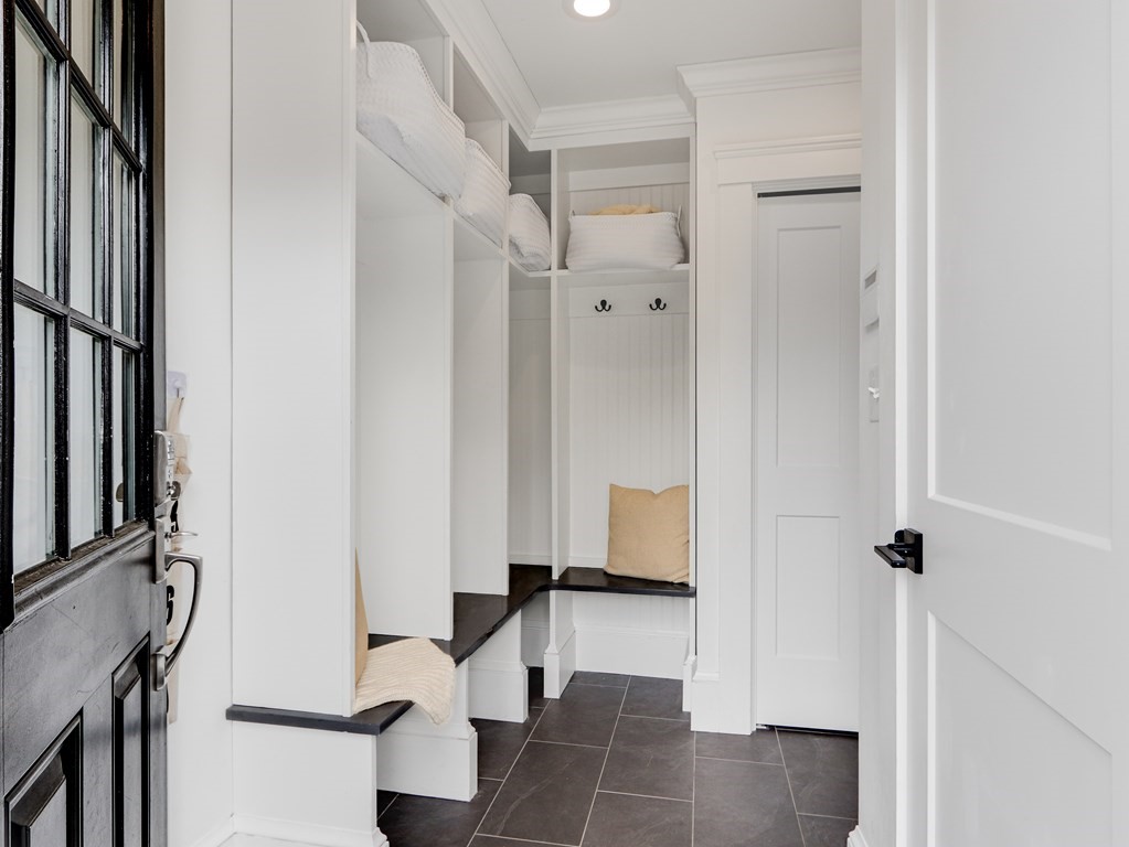 18 Brackett Road Newton, MA 02458 - Photo 29 of 32 a bathroom with a shower and a sink