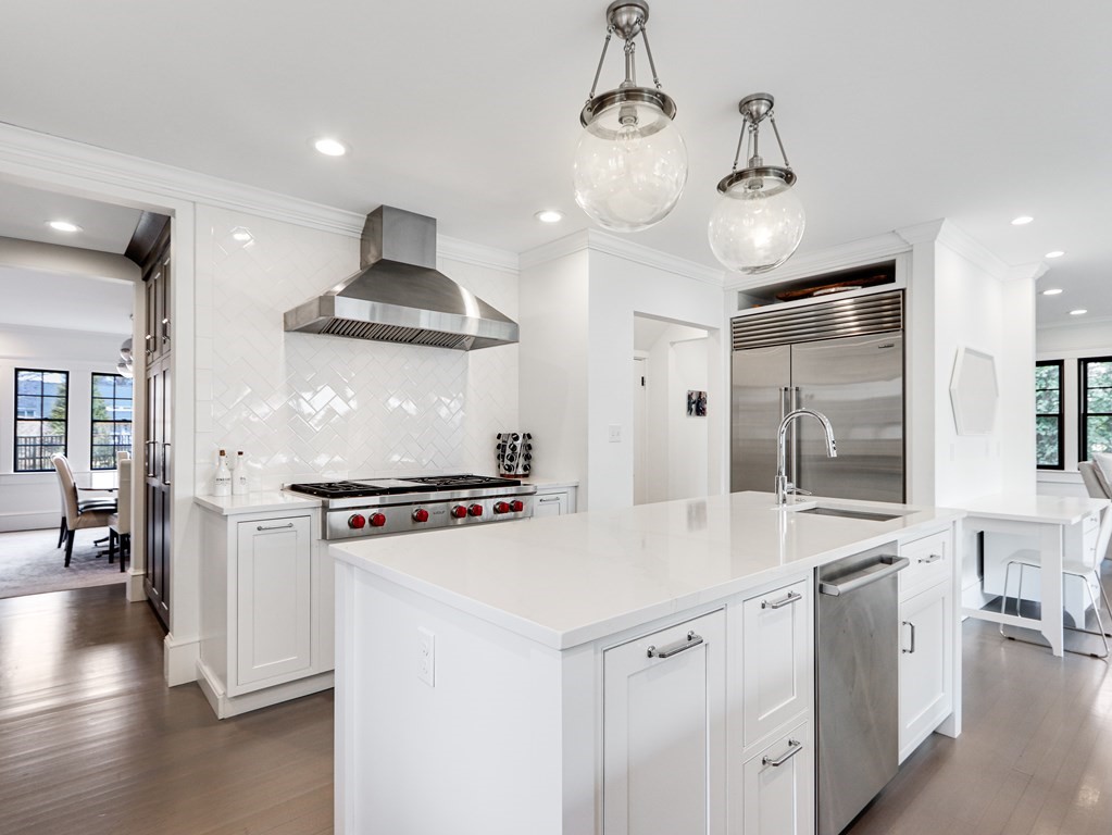 18 Brackett Road Newton, MA 02458 - Photo 5 of 32 a kitchen with stainless steel appliances a stove a sink and a refrigerator