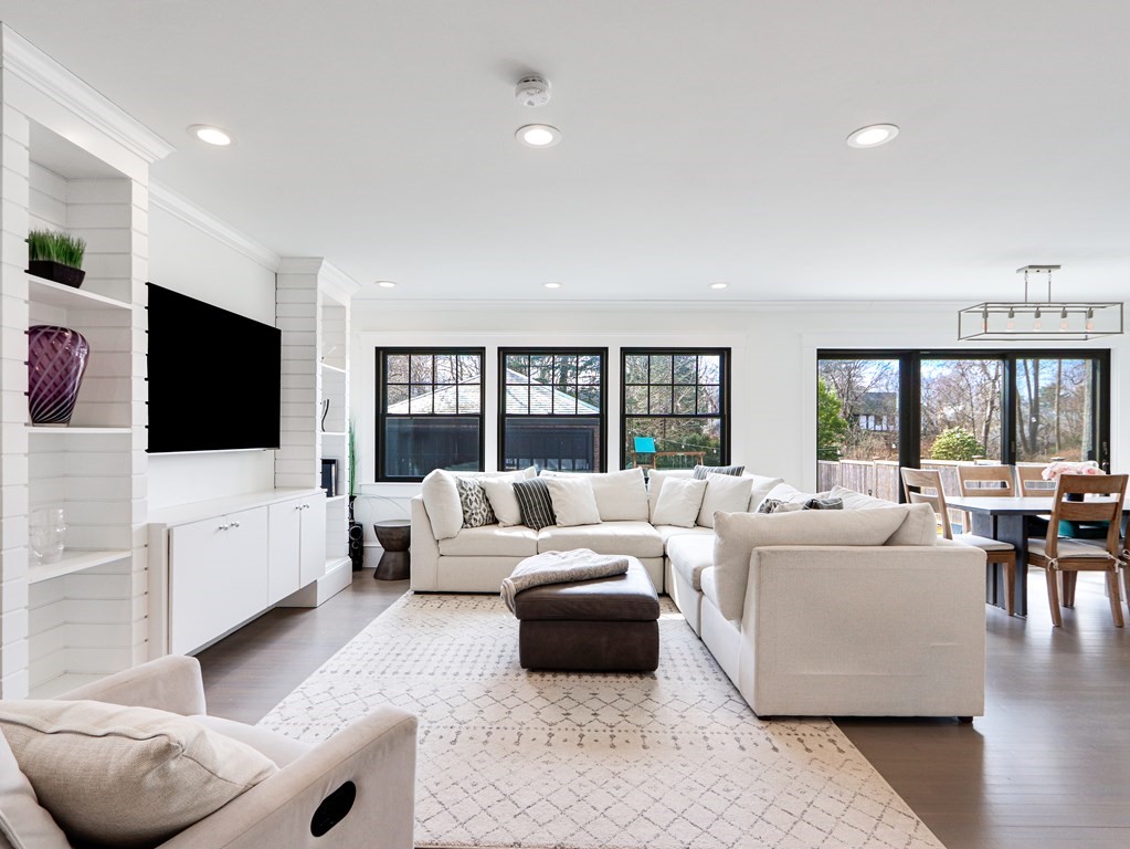 18 Brackett Road Newton, MA 02458 - Photo 8 of 32 a living room with furniture and a flat screen tv