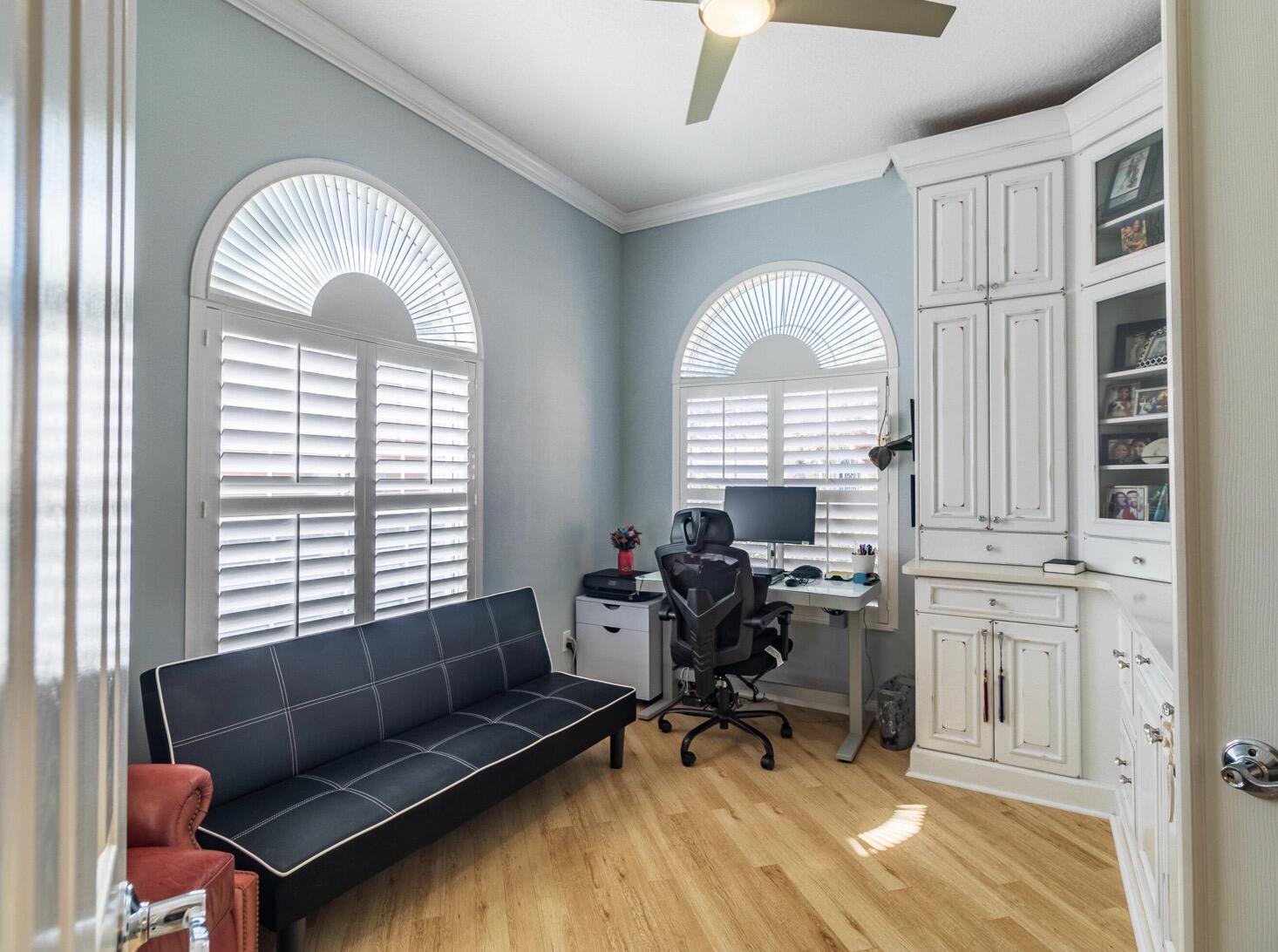 11355 Southwest Rockingham Drive Port St. Lucie, FL 34987 - Photo 5 of 31 a view of a livingroom with workspace and a window