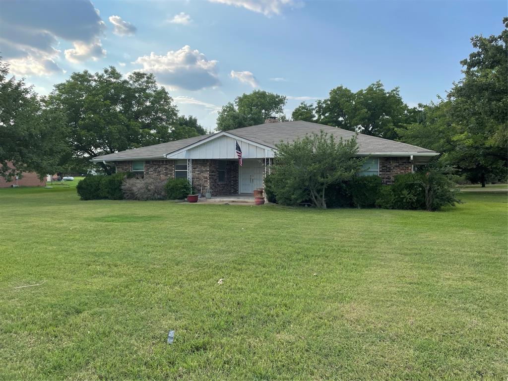 100 Cherokee Path Flower Mound, TX 75028 - Photo 1 of 1 a view of a house with a yard