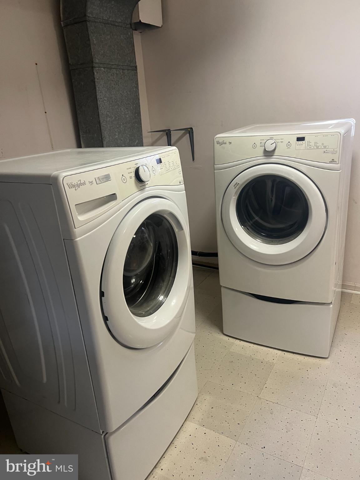 215 Summit Hall Road Gaithersburg, MD 20877 - Photo 15 of 20 a utility room with dryer and washer