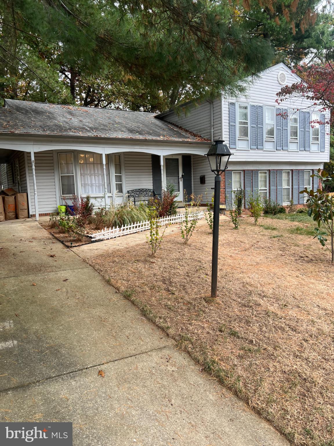 215 Summit Hall Road Gaithersburg, MD 20877 - Photo 20 of 20 a front view of a house with a patio