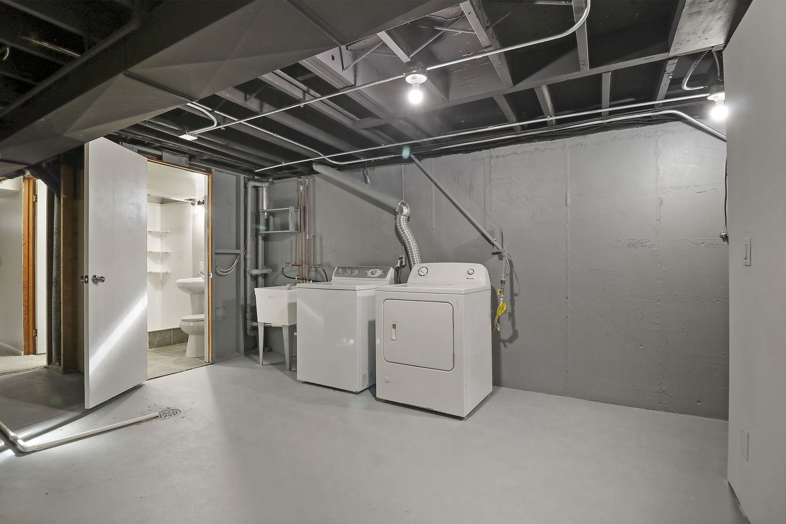 111 Wagner Drive Cary, IL 60013 - Photo 20 of 23 a utility room with dryer and washer