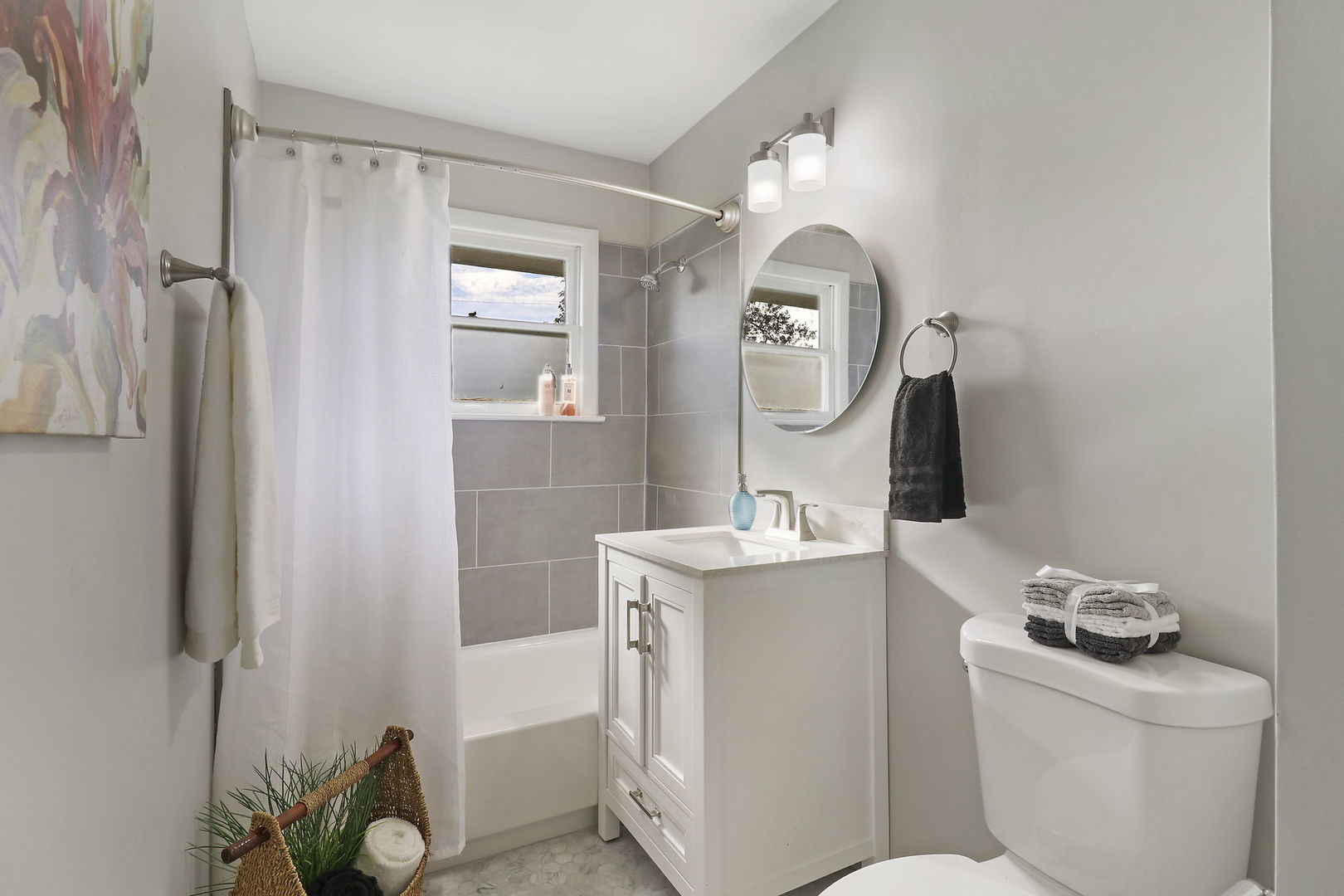 111 Wagner Drive Cary, IL 60013 - Photo 10 of 23 a bathroom with a toilet sink vanity granite and a mirror