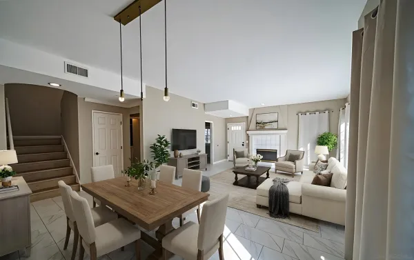 a view of an empty room with a fireplace and a window
