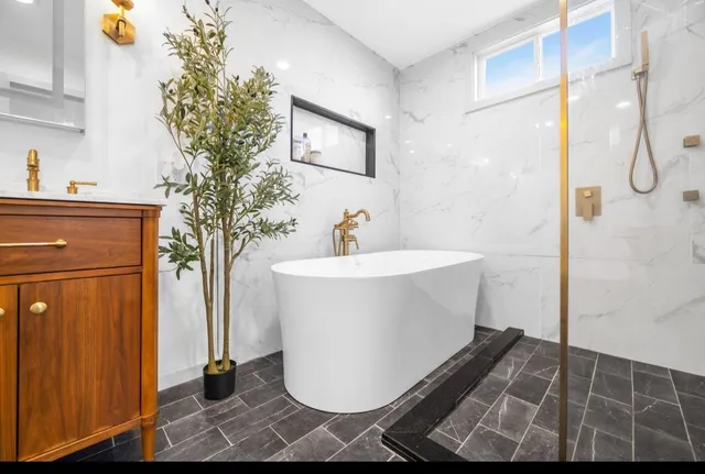 a view of a house with swimming pool and sitting area