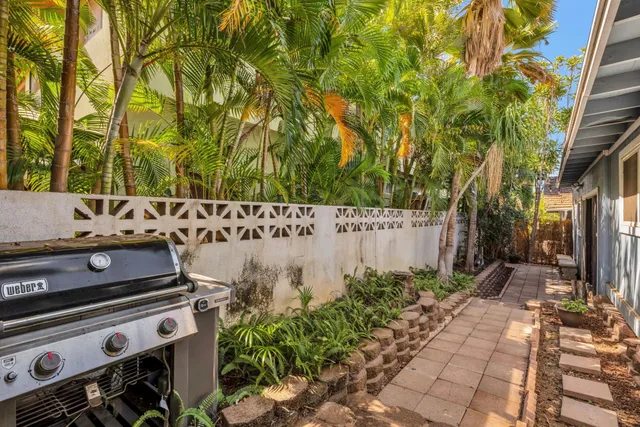 a bedroom with a bed and furniture