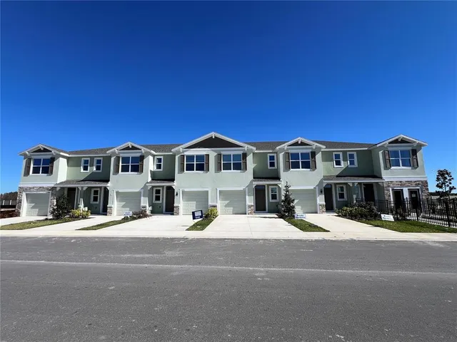 a view of a street with houses
