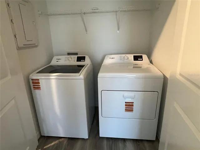 a utility room with dryer and washer