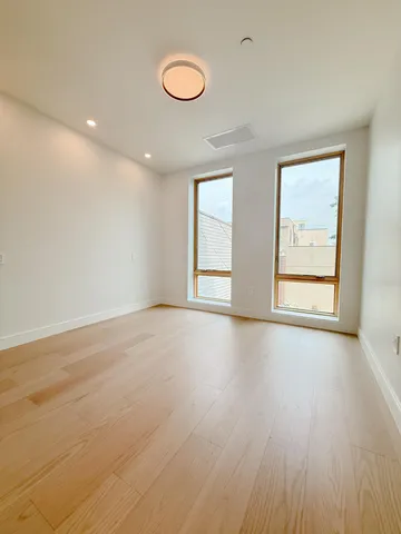 an empty room with windows