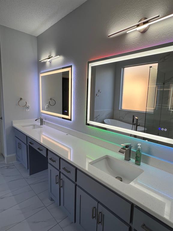 1224 Harvard Lane Allen, TX 75002 - Photo 8 of 26 Double sink vanity with twin LED mirrors