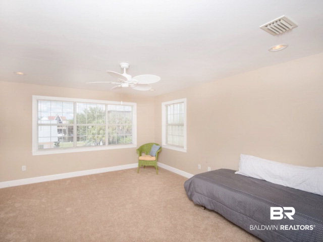26595 Marina Road Orange Beach, AL 36561 - Photo 19 of 29 There are two bonus rooms that can be large storage closets or are big enough for a small office or childs play room