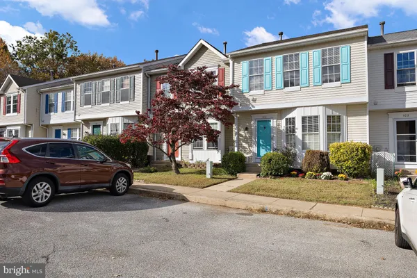 a car parked in front of a house