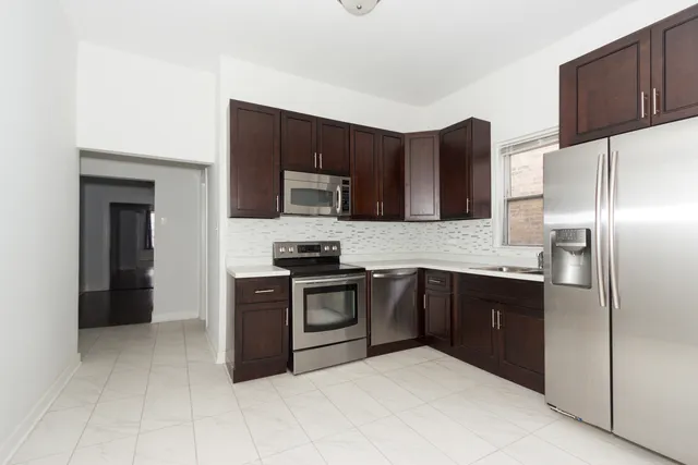 $630,000 | 618 East 50th Place, Chicago, IL 60615