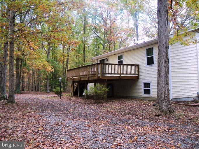 6104 Ridge Tree Road Fredericksburg, VA 22407 - Photo 16 of 26 a view of a house with a yard