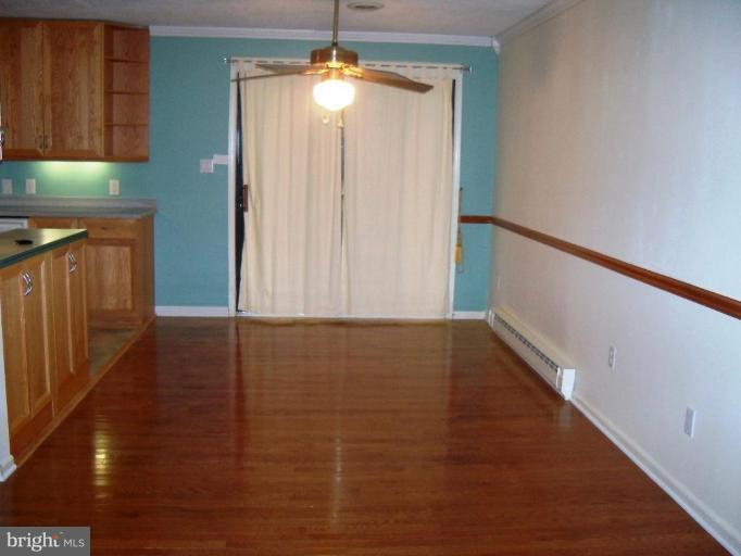 6104 Ridge Tree Road Fredericksburg, VA 22407 - Photo 5 of 26 a view of an empty room with a window