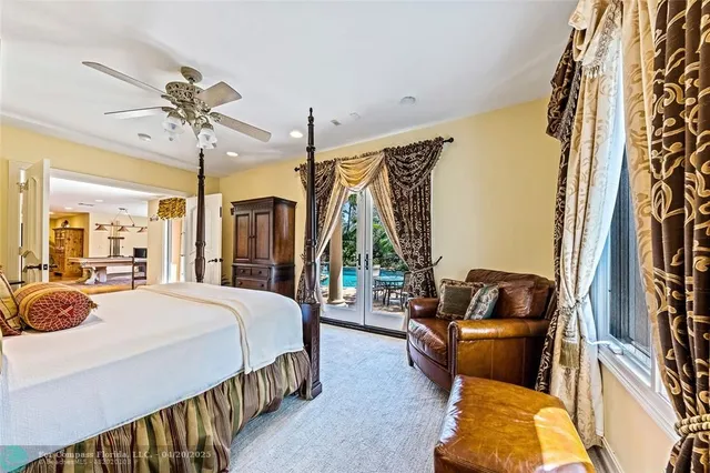 a bedroom with bed and wooden floor