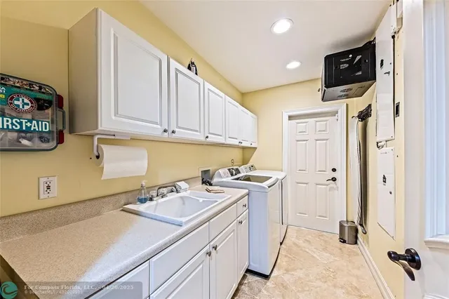 a view of a patio with couches table and chairs and wooden floor