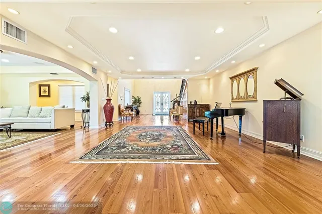 a view of a living room and dining room