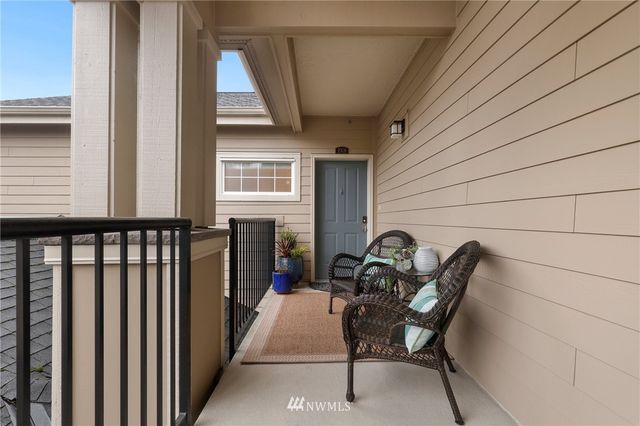 a view of a two chairs in the roof deck