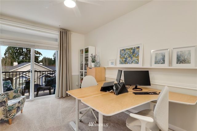 a view of a workspace with furniture