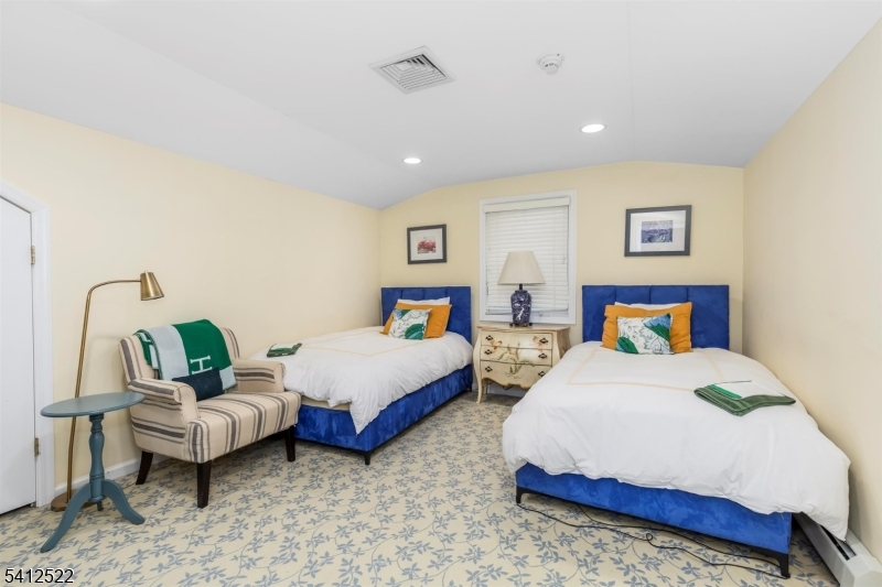 6 Harding Court Passaic, NJ 07055 - Photo 15 of 17 a bedroom with 2 bed and couch